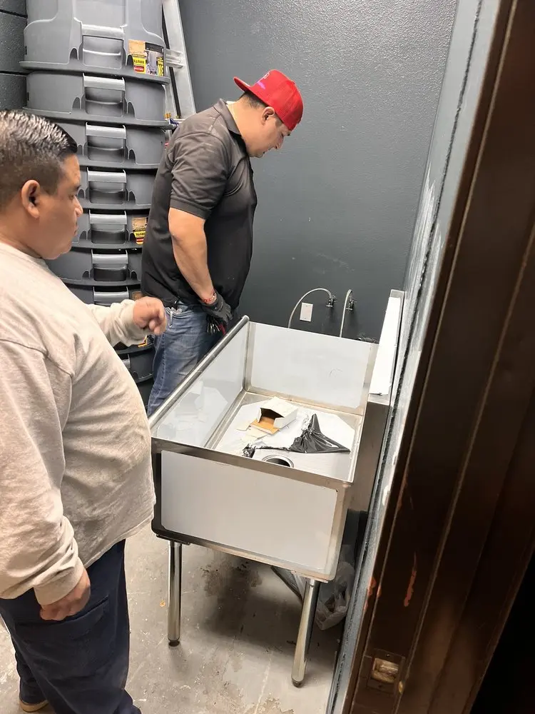 Commercial plumbing and sink installation in McGraw